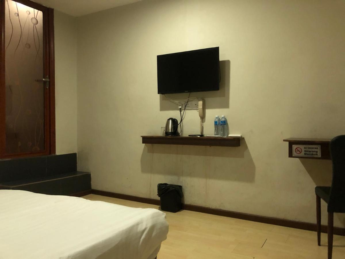 Super Oyo 90668 Joy Inn Miri Exterior photo